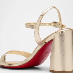 Christian Louboutin
Miss Jane Metallic Red Sole Ankle-Strap Sandals